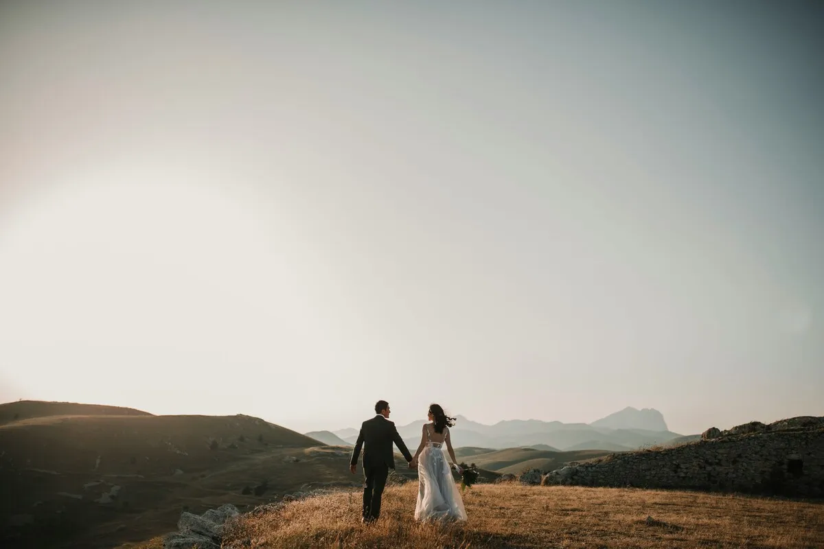 Wedding couple Photograph with mountain views