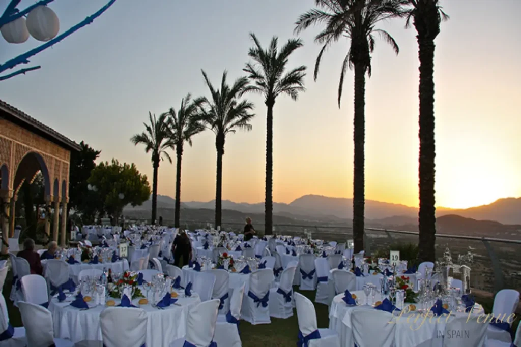 Malaga venue with sunset and palmtrees