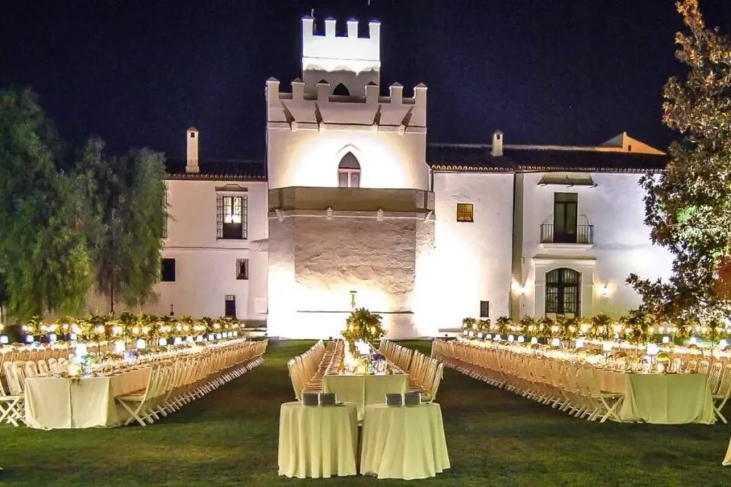castle style wedding venue with banquet at night